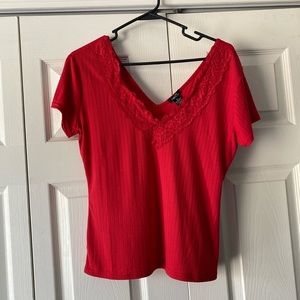 red v-neck shirt w/ lace around neckline